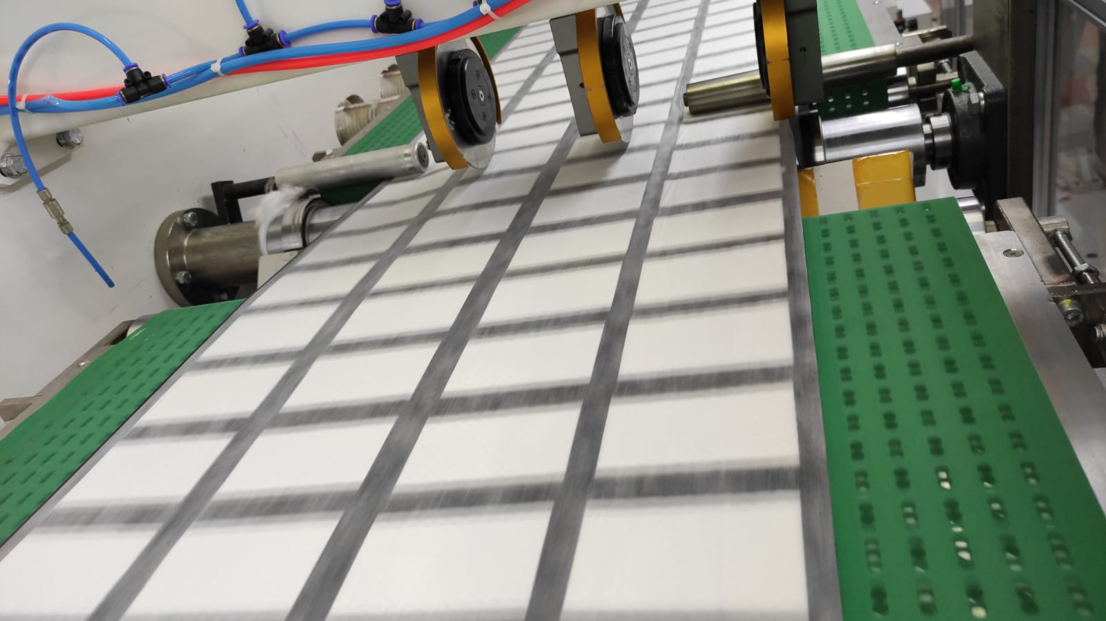 Absorbent pad production line in the manufacturing facility